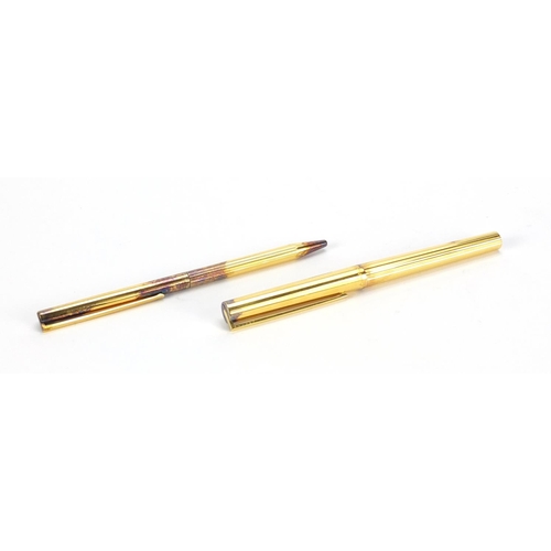 2567 - S J Dupont silver gilt fountain pen and ballpoint pen, the fountain pen with 18ct gold nib, serial n... 
