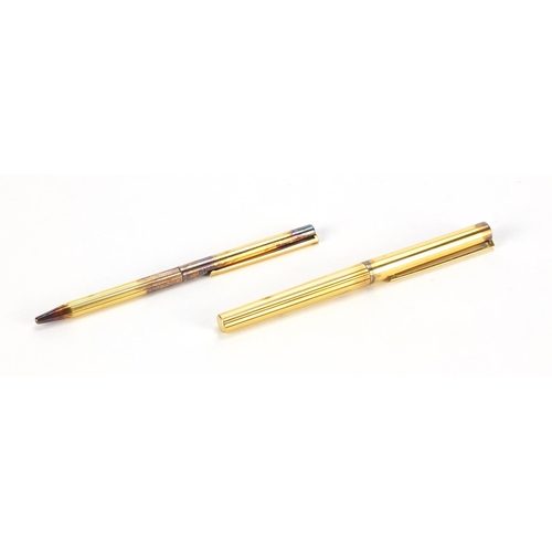 2567 - S J Dupont silver gilt fountain pen and ballpoint pen, the fountain pen with 18ct gold nib, serial n... 
