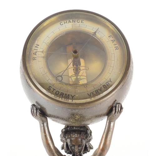2139 - Patinated wall mounted barometer with silvered dial and mermaid support, J A Tognacca Amsterdam labe... 