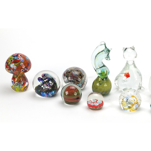 2272 - Twelve colourful glass paperweights including Selkirk, S J Penn-Smith, Caithness and Mdina, the larg... 