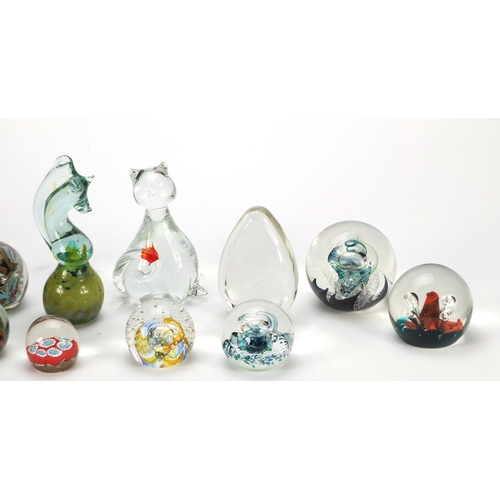 2272 - Twelve colourful glass paperweights including Selkirk, S J Penn-Smith, Caithness and Mdina, the larg... 