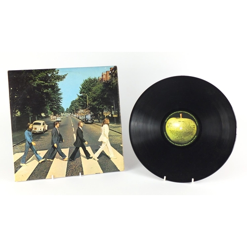 2532 - Vinyl LP's and singles including The Beatles Abbey Road with misaligned Apple sleeve, Prince and The... 