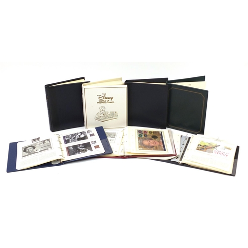 2694A - Commemorative stamps and coin covers, arranged in seven albums including The Disney World of postage... 