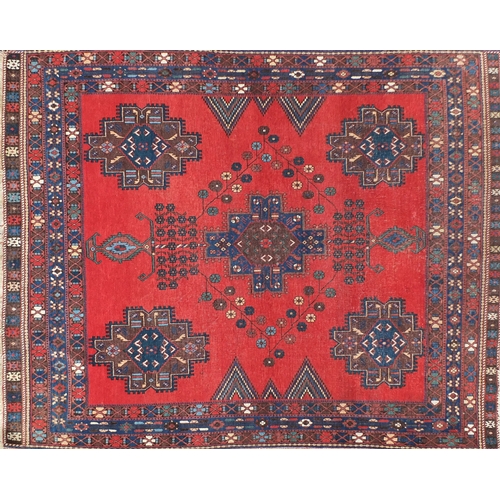 2039 - Blue and red ground rug with all over geometric design, 160cm x 133cm