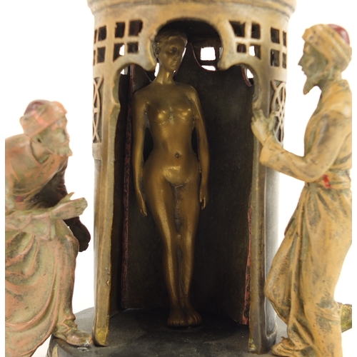 2237 - Cold painted bronze of two Arab men peeping at a nude female behind a revolving curtain in the style... 