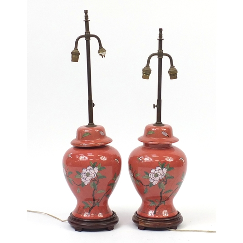 2411 - Pair of Chinese porcelain baluster vases and cover table lamps raised on hardwood stands, hand paint... 