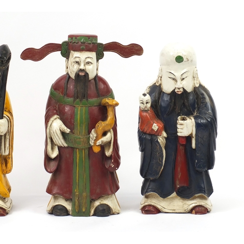 2397 - Three large Chinese hand painted carved wood Gods comprising prosperity, Longevity and happiness, 66... 