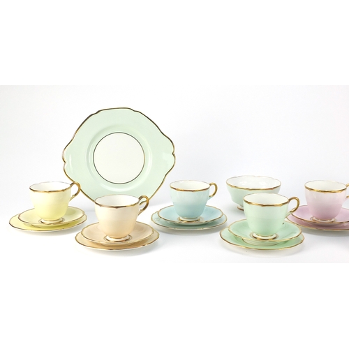 2367 - Paragon Harlequin six place tea service with milk jug and sugar bowl, the largest 25cm in length