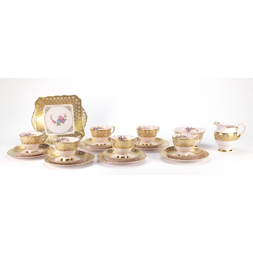 2264 - Tuscan six place tea service, hand painted and gilded with flowers