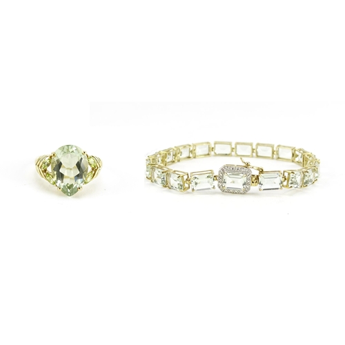2800 - 9ct gold green amethyst and diamond bracelet and a 9ct gold green amethyst and peridot ring, size K,... 