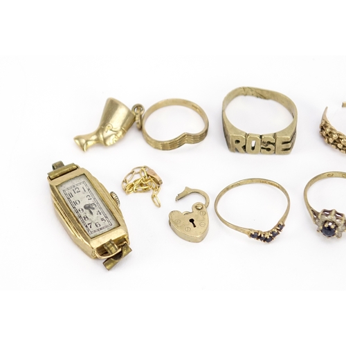 2788a - 9ct gold jewellery including rings, charms and a wristwatch, 22.0g