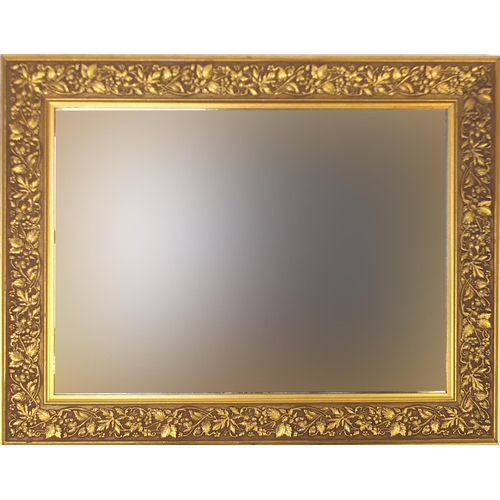 90 - Rectangular gilt framed mirror with bevelled edge, 73cm x 58cm