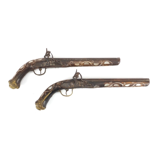 1118 - Pair of flintlock antique style pistols with mother of pearl inlay, 42cm in length