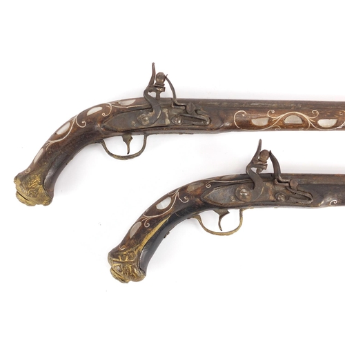 1118 - Pair of flintlock antique style pistols with mother of pearl inlay, 42cm in length