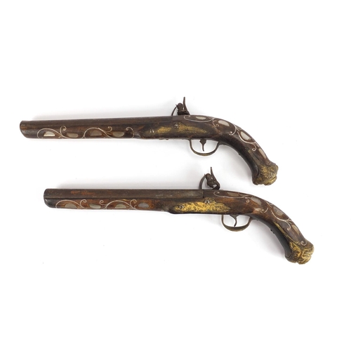 1118 - Pair of flintlock antique style pistols with mother of pearl inlay, 42cm in length