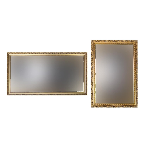 77 - Two rectangular gilt framed wall hanging mirrors, the largest 98cm x 53cm