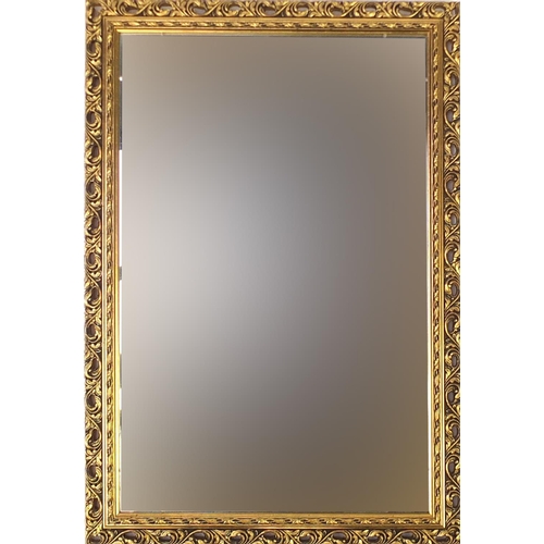 77 - Two rectangular gilt framed wall hanging mirrors, the largest 98cm x 53cm