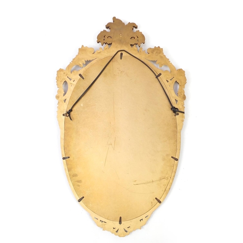 62 - Oval gilt framed wall hanging mirror, 83cm x 51cm