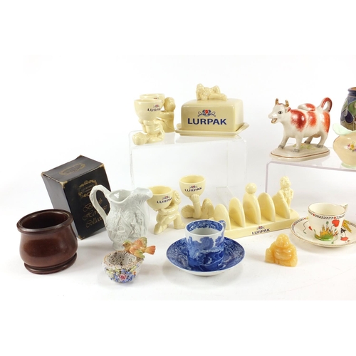 670 - China including Lurpack advertising items, a Staffordshire style cow creamer, Royal Doulton stonewar... 