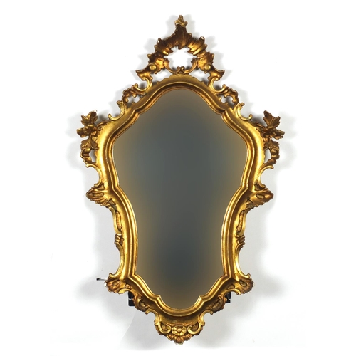 25 - Gilt framed cartouche shaped wall hanging mirror, 76cm x 48cm