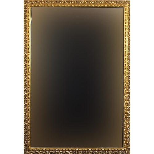 99 - Two ornate gilt framed mirrors including a rectangular example, the largest 100.5cm x 69cm