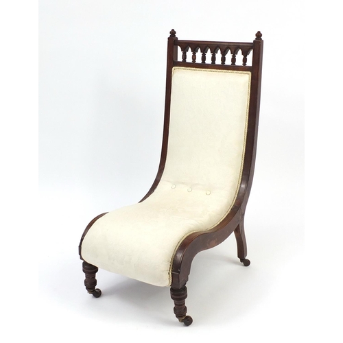 37 - Victorian mahogany framed sleigh chair with cream floral upholstery, 93cm high