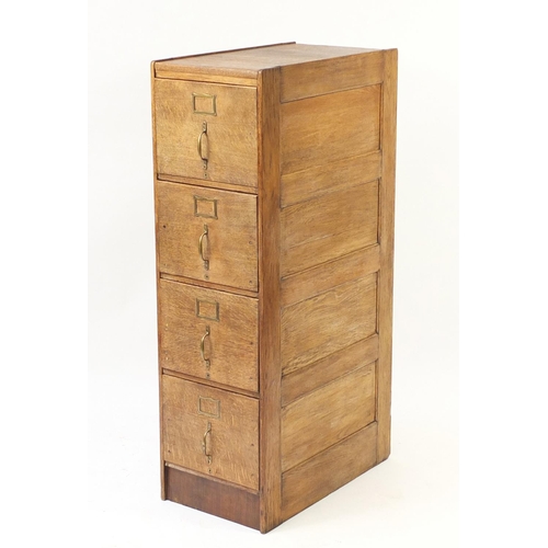 14 - Industrial oak four drawer filing chest, 135cm H x 40cm W x 70cm D
