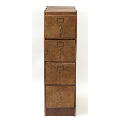 14 - Industrial oak four drawer filing chest, 135cm H x 40cm W x 70cm D