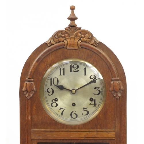 98 - Oak cased wall hanging clock with Westminster chime, 80cm high