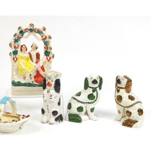 685 - Victorian and later pottery including Staffordshire spaniels, the largest 38cm high