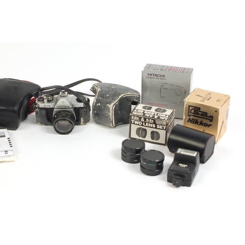 686 - Cameras, lenses and accessories including Pentax, Asahi, Nikkor, Olympus and Hitachi