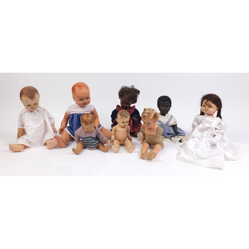 622 - Eight vintage composite dolls, some with articulated limbs and open/close eyes, the largest 62cm hig... 