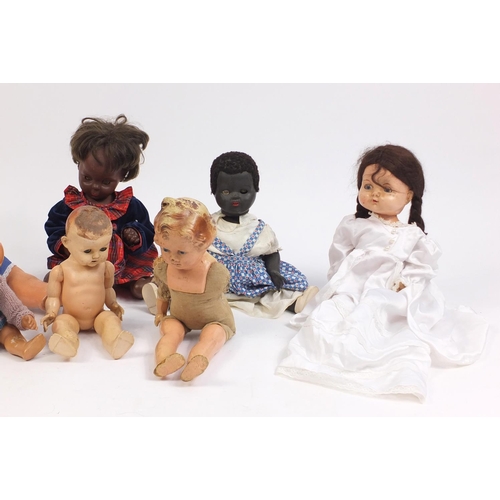 622 - Eight vintage composite dolls, some with articulated limbs and open/close eyes, the largest 62cm hig... 