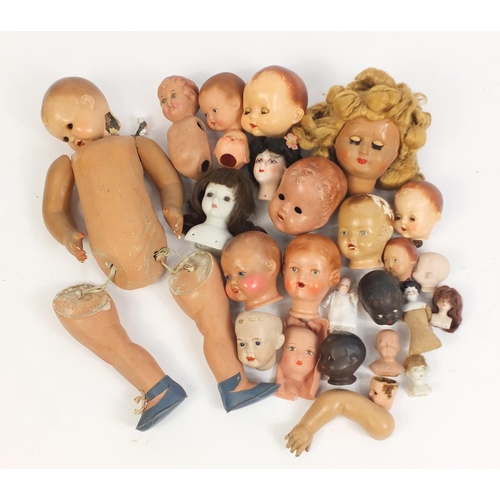 609 - Vintage dolls heads and limbs including some bisque