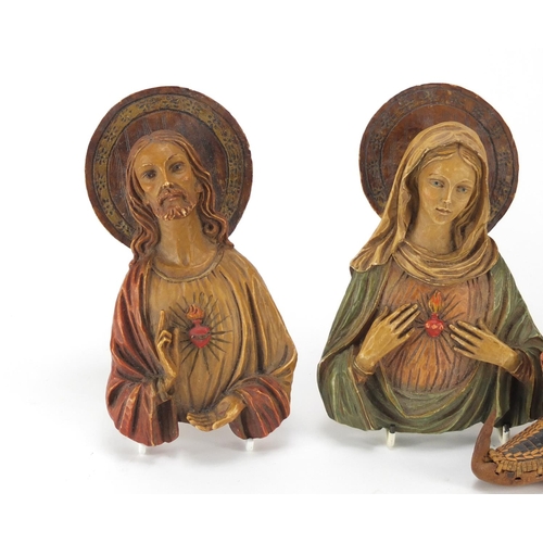 654 - Objects including a pair of hand painted religious icons and a pair of miniature leather and embroid... 