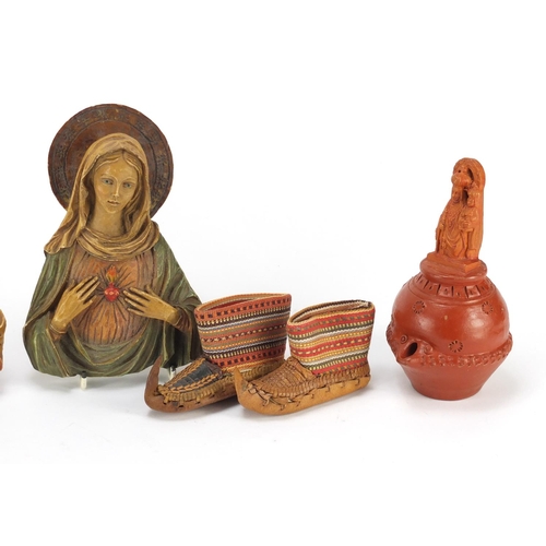 654 - Objects including a pair of hand painted religious icons and a pair of miniature leather and embroid... 