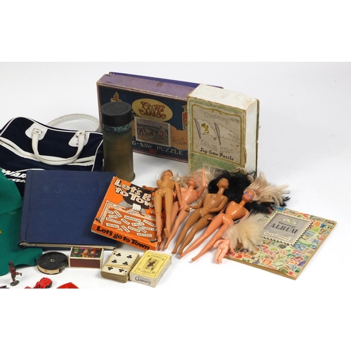 680 - Vintage and later toys, stamps and postcards including die cast vehicles, 1960's dolls and a roulett... 