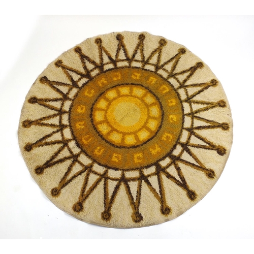 72 - 1960's wool sunburst design rug, 200cm in diameter