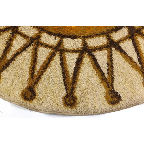 72 - 1960's wool sunburst design rug, 200cm in diameter