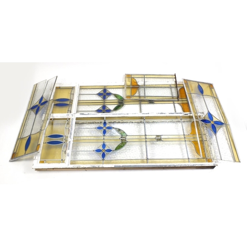 80 - Fve leaded stained glass panels, the largest 173cm x 62cm