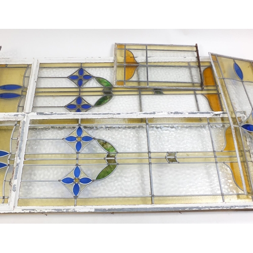 80 - Fve leaded stained glass panels, the largest 173cm x 62cm