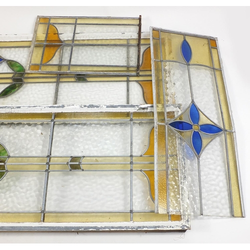 80 - Fve leaded stained glass panels, the largest 173cm x 62cm