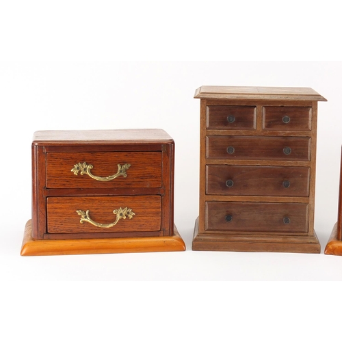 12 - Three wooden chests of small proportions, one with inlay, the largest 26cm high