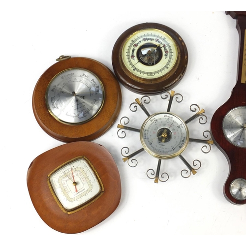 694 - Seven wall hanging barometers, the largest 50cm in length