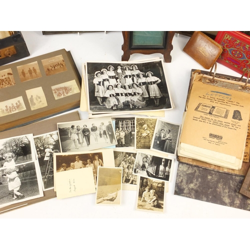 1084 - 19th century and later ephemera including black and white photograph albums and framed photographs
