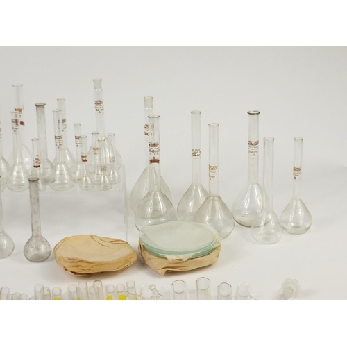 648 - Large selection of chemist measures and  syringes, test tubes and beakers