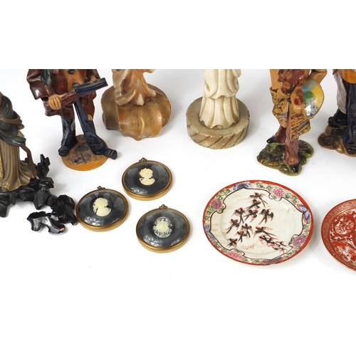 677 - Decorative figures and plates including Italian pottery figures, carved onyx Chinese figures and thr... 