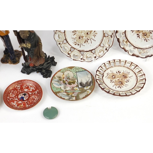 677 - Decorative figures and plates including Italian pottery figures, carved onyx Chinese figures and thr... 