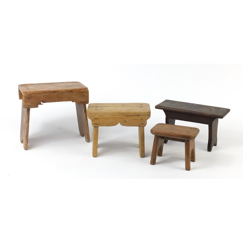 51 - Four Provincial wood stools, the largest 25cm H x 27cm W x 15cm D