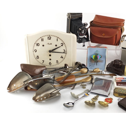 628 - Objects including lighters, vintage cameras, porcelain clock and shoe stretchers